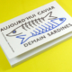 Livre sur fond jaune présentant une couverture au design graphique illustrant un poisson, accompagné du texte "AUJOURD'HUI CAVIAR DEMAIN SARDINES.